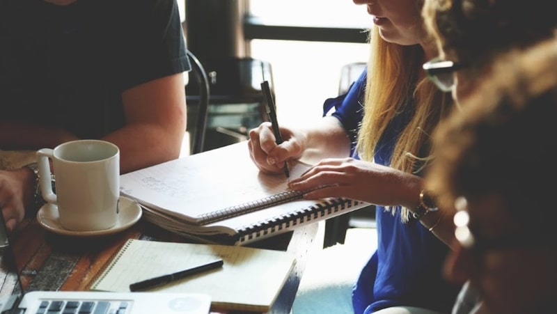 People around a desk